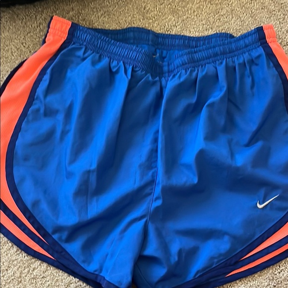 Nike Pants - 4 pair Nike Tempo shorts. All have liner.  
All in very good condition.